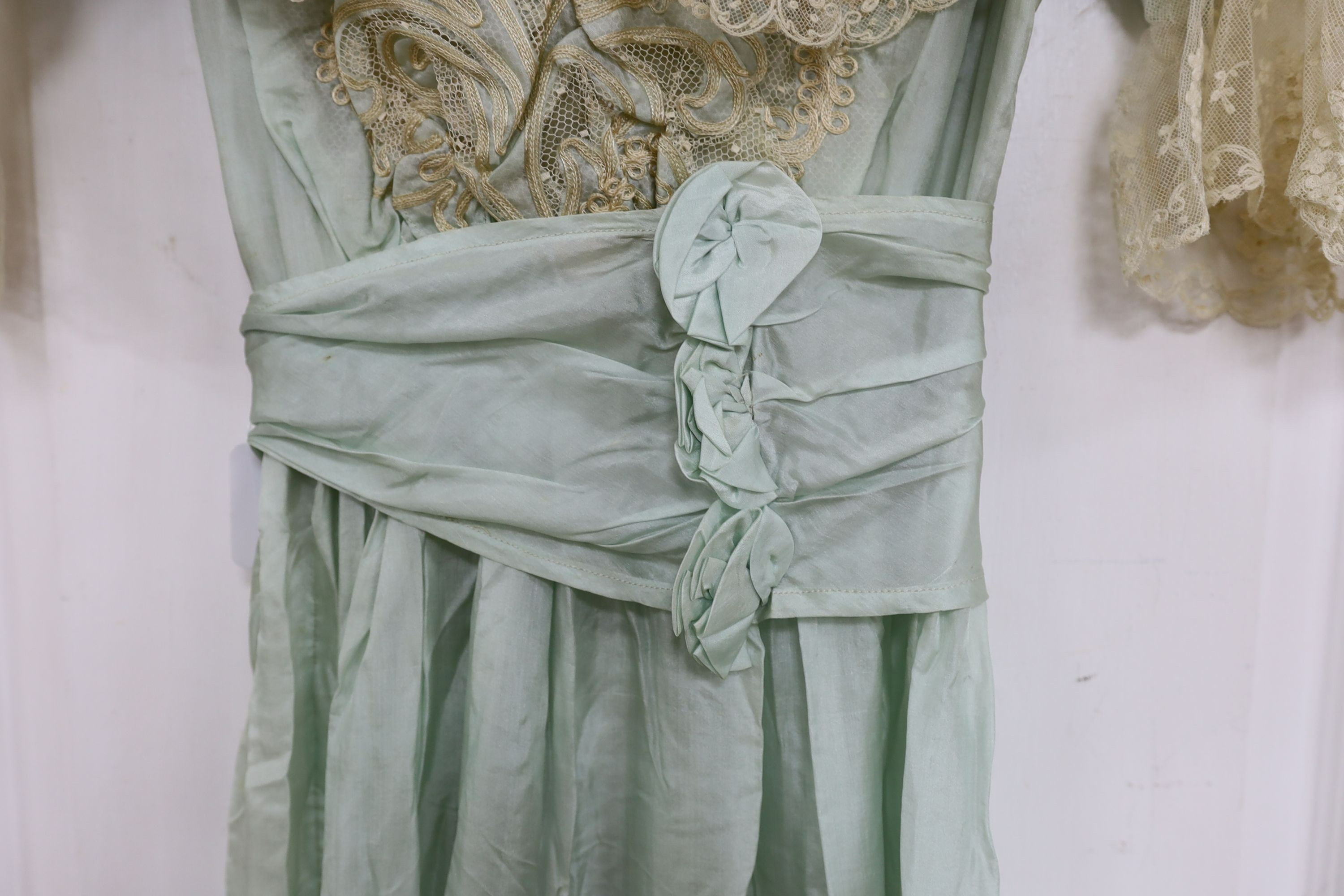An Edwardian fine turquoise silk and ecru embroidered and lace ladies dress